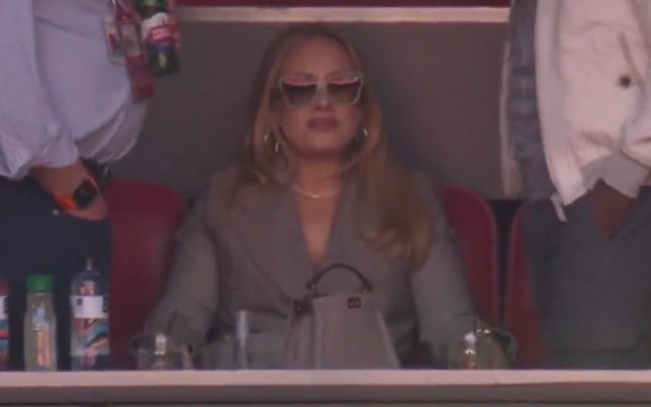 Adele Generates New Meme With Her Suited-Up Look at Super Bowl LVII
