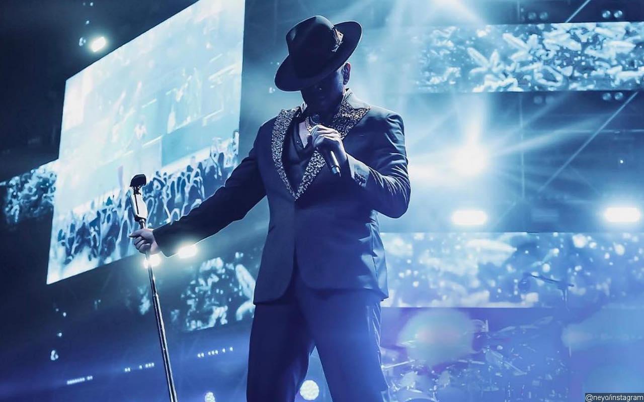 Watch Ne-Yo Hilariously Kick Out Fan for Taking His Hat Onstage in Viral Video