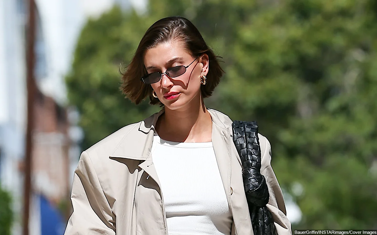 Hailey Bieber Quickly Removes Picture of Her Bare Tummy Amid Pregnancy Rumors