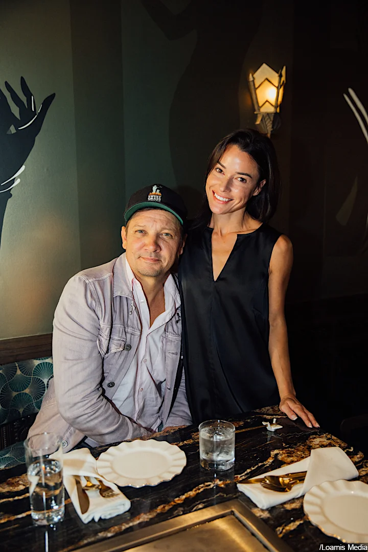 Jeremy Renner Parties With Brunette Beauty
