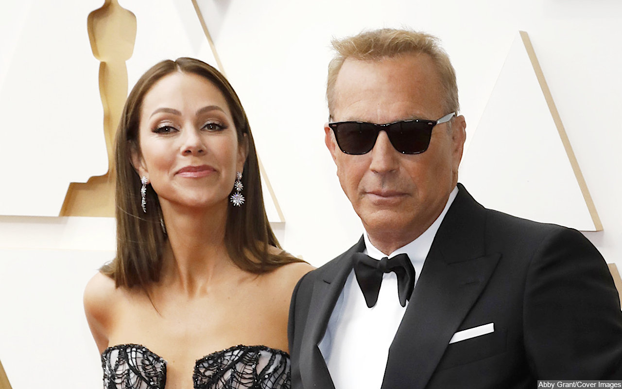 Kevin Costner and Christine Baumgartner
