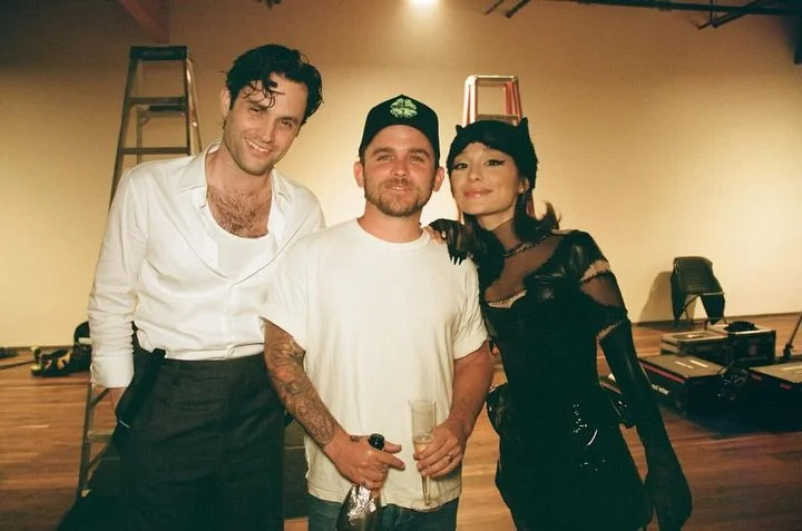 Penn Badgley shares a behind-the-scenes pic with Ariana Grande