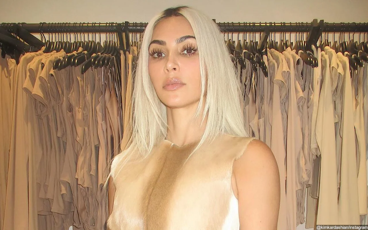 Kim Kardashian Flashes Her Famous Backside in Glamorous Photo Shoot