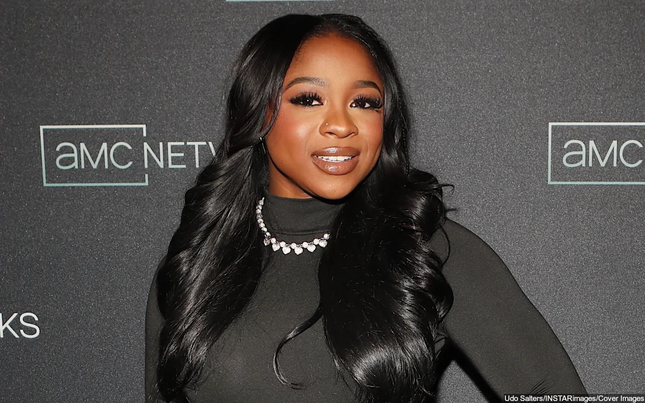 Reginae Carter Spotted Holding Hands With New Boyfriend
