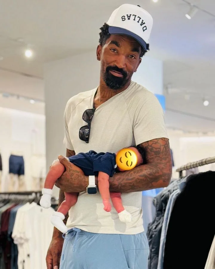 J.R. Smith is holding his newborn baby