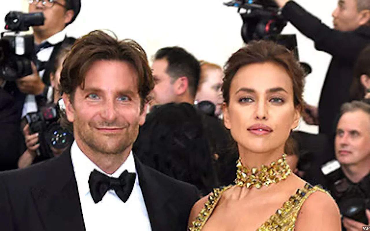 Irina Shayk Spotted Handing Over Dog Peanut to Bradley Cooper in New York City