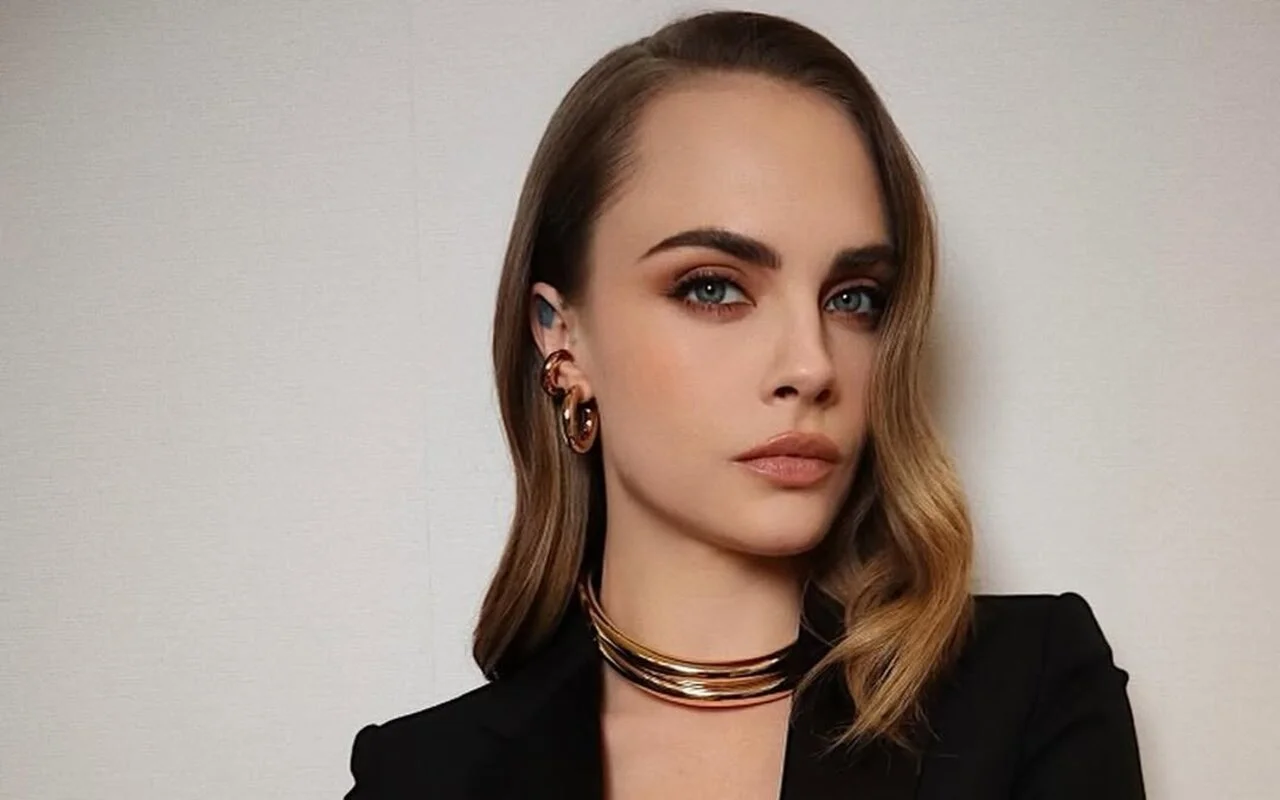 Cara Delevingne Sparks Frenzy with Baby Bump Photo to Mark New Year