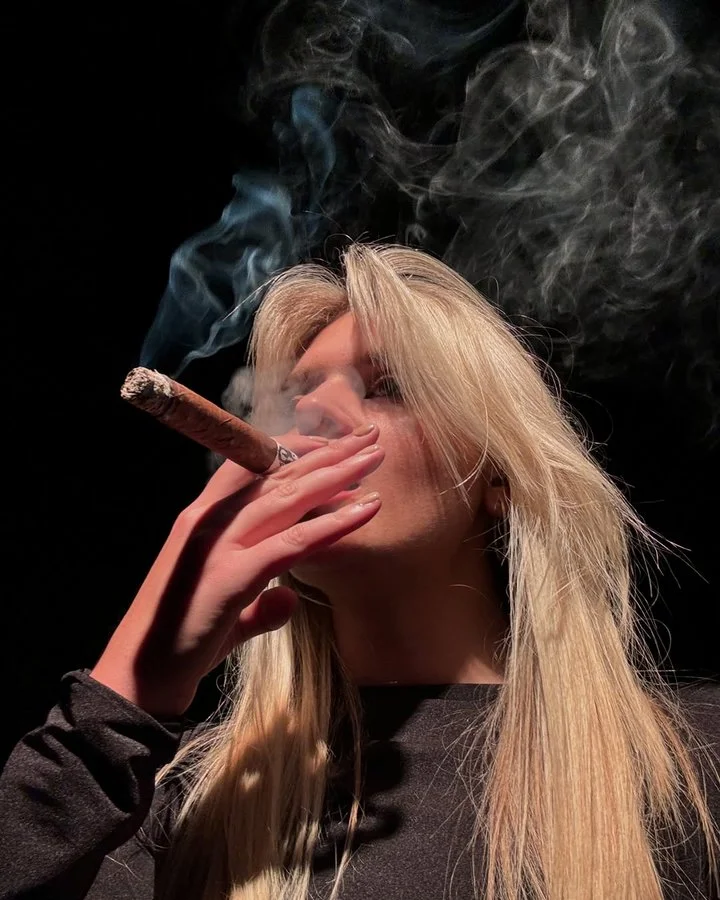 Ellie Fallon smoking David Harbour's favorite cigar