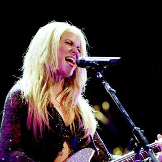 Shakira; in Shakira Tour of the Mangoose Live in Chicago