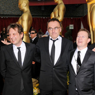 Simon Beaufoy;Danny Boyle;Christian Colson; in 81st Annual Academy Awards - Arrivals