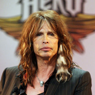 Steven Tyler in Aerosmith Launches Their New Video Game "Guitar Hero: Aerosmith" at Hard Rock Cafe in New York