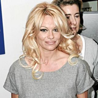 Pamela Anderson in Pamela Anderson, New Ambassador of PETA, Visits the Brigitte Bardot Foundation in Paris
