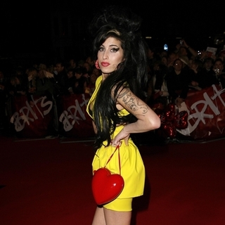 Amy Winehouse; in 2007 Brit Awards - Arrivals