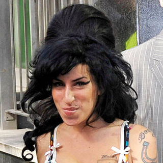 Amy Winehouse in Amy Winehouse Arrives at the Westminister Magistrates Court in London on March 17, 2009
