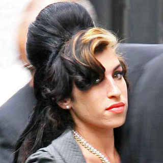 Amy Winehouse in Amy Winehouse Arrives at the City of Westminster Magistrates Court in London on July 23, 2009