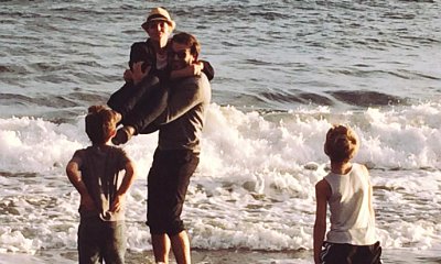 Britney Spears Plays on the Beach With Boyfriend Charlie Ebersol and Her Two Sons