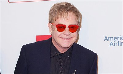 Video: Elton John Falls Off Chair at Tennis Tournament