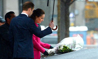Prince William and Kate Middleton Brave the Rain, Pay Their Respects at September 11 Memorial