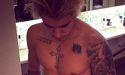 Justin Bieber Laughs Off Photoshop Claims With Real Abs Photo