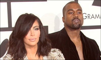 Kim Kardashian Looks Embarrassed by Kanye West's 'Broke Black Dudes' Joke at BET