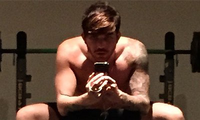 Adam Lambert Shares Shirtless Workout Selfie on Instagram