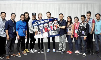 Liam Payne Covers Zayn Malik's Face on Poster During Promotional Photo, Fans Get Angry