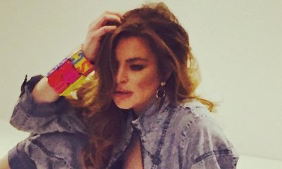 Lindsay Lohan Flashes Boob in New Photo Shoot