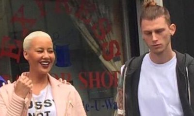 Amber Rose and Machine Gun Kelly Get Cozy at LAX, Spark Dating Rumors
