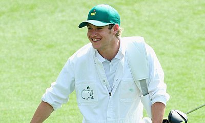 Niall Horan Takes a Tumble When Serving as Caddie for Golf Pro Rory McIlroy