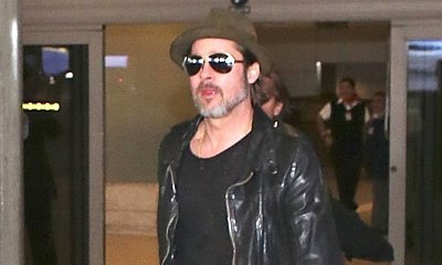 Brad Pitt NOT 'Caught Naked' With Another Woman at His House