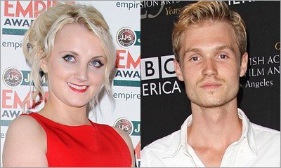 Evanna Lynch and Robbie Jarvis Post PDA Pics, Spark Dating Rumors