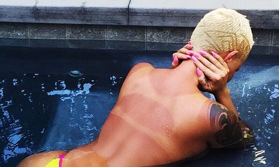 Amber Rose Goes Topless, Shows Off Tan Line in Instagram Pic