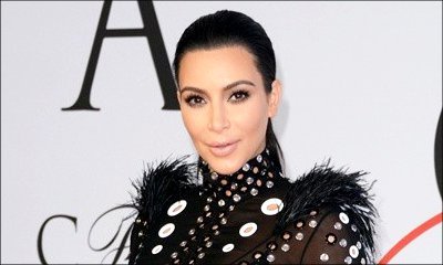 Kim Kardashian Denies She Is Pregnant With Baby Boy