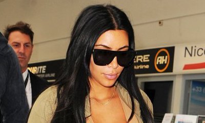 Kim Kardashian Takes a 'Fun Video' of Drunk Naked Woman Trying to Enter Her Hotel Room