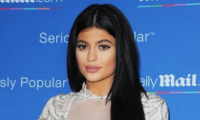 Kylie Jenner Flaunts Flat Abs in Crop Top and Tight Pants