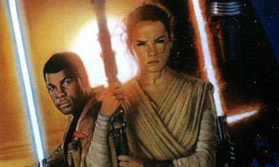 John Boyega Wielding Lightsaber in First 'Star Wars: The Force Awakens' Poster