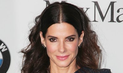 Sandra Bullock Brought a 'Super Hot' Date to Jennifer Aniston's Secret Wedding