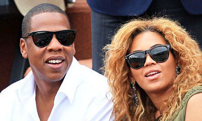 Beyonce and Jay-Z Cuddle and Lock Lips by the Sea in Italy