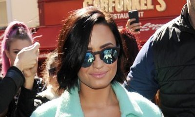 Demi Lovato Hints at Bisexuality, Says She's Had Experience With It