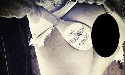 Heidi Klum Flashes Pert Derriere as She Gets 'Spanked' With 'Naughty Spoon'