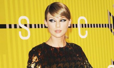 Taylor Swift Mocks Press Over Marriage and New Mansion Rumors
