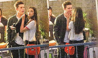 Brooklyn Beckham's Rumored Girlfriend Playfully Caresses His Face at Concert