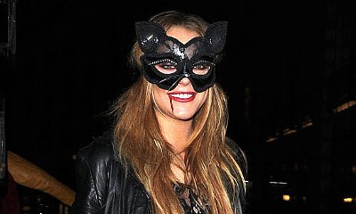 Lindsay Lohan Dresses Up as Sexy Cat at Halloween Party