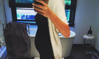 Pregnant Chrissy Teigen Denies Rumors She's Expecting Twins