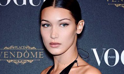 Bella Hadid Shows Nipple Piercing in Barely-Covering Dress