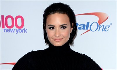 Demi Lovato Takes a Tumble at New York Jingle Ball