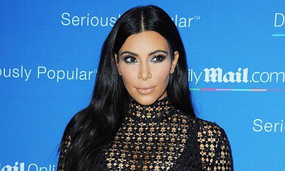 Kim Kardashian Shares Picture of Her Butt Getting Rubbed by Mystery Man