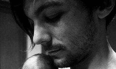 Louis Tomlinson Debuts Baby Boy, Reveals His Name in Cute Picture