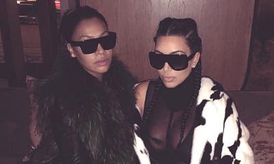 Kim Kardashian Flaunts Major Cleavage in Cruella DeVille-Inspired Outfit