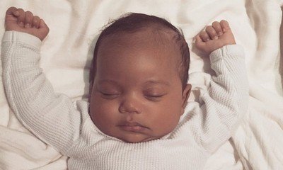 Kim Kardashian Shares First Photo of Son Saint West on Her Father's Birthday